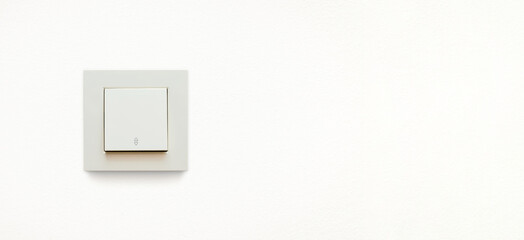 Cream colored wall mounted cream colored vavien or two-way light switch