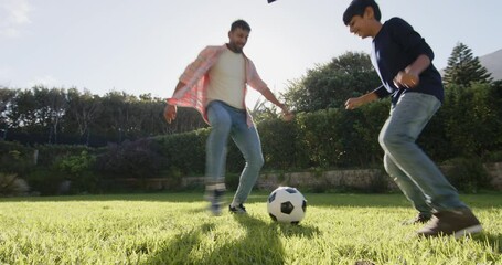 Running in park, Indian father and young son enjoying outdoor activity together - Powered by Adobe