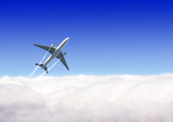 Horizontal nature background with aircraft and Jet trailing smoke in the sky. Airplane and...