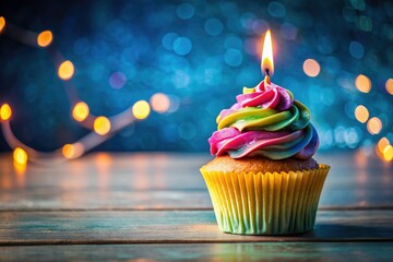 Delicious birthday cupcake, vibrant icing swirls, a celebratory candle, perfect sweet party dessert.