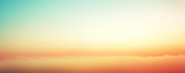 Fototapeta premium Blurred abstract background concept. A tranquil gradient sky at sunset, featuring soft hues of blue, pink, and orange.