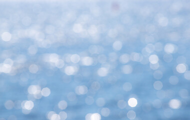 Bokeh abstract blue water background.