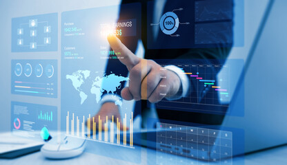 Businessman using KPI dashboard.Financial business data analytics graph dashboard. Management data System KPI connected in database for follow earnings,operations and sales data.