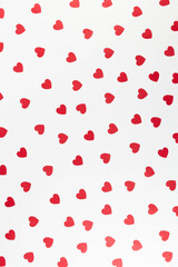 Top view of red hearts on white background. Valentine's day, red hearts, love wallpaper. Flat lay, copy space.
