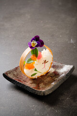 japanese dish with fish and edible flower
