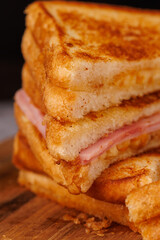 Tasty Tower of Ham and Cheese Sandwiches on a Gray Concrete Table
