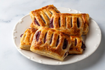 Miniature Danish Pastries with cherry, close up