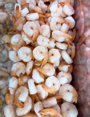 A pile of shrimp with a few pieces missing