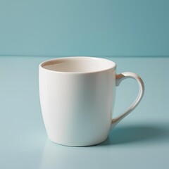 Fototapeta premium Blank white mug mockup on blue background.