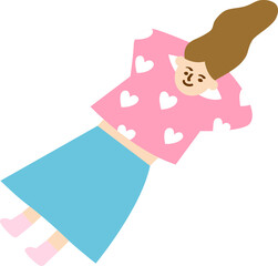 A woman is laying on the ground