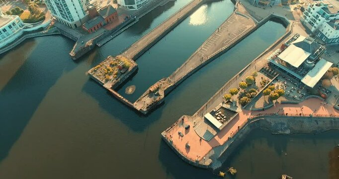 Aerial footage of the Mount Stuart Graving Docks on a sunny day in the city of Cardiff, Wales, UK