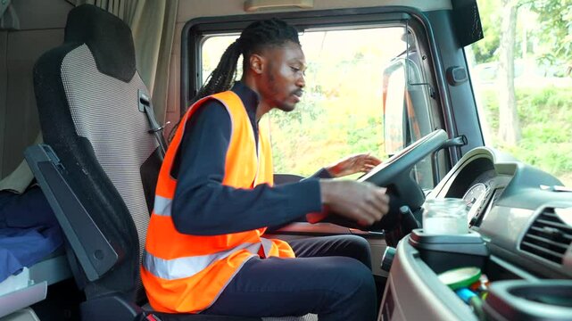 Truck driver preparing for delivery, adjusting mirrors and seat