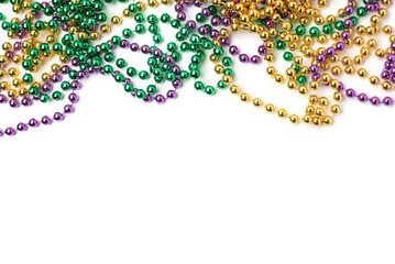 Mardi Gras beads isolated on white background
