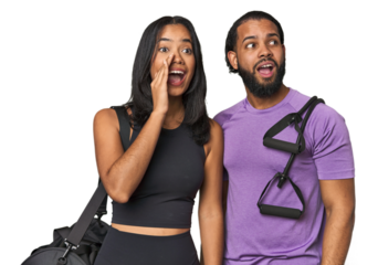 Young Latino couple ready for gym training shouting and holding palm near opened mouth.