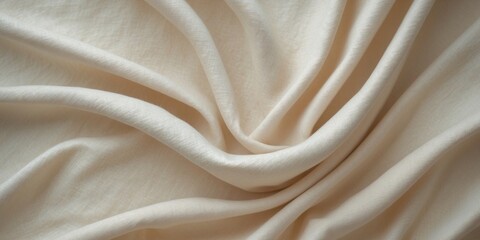 Obraz premium Creamy textured fabric softly draped in folds