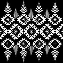 The geometric ethnic pattern of traditional style. Navajo, America Indian patterns. Design for background, wallpaper, clothing, wrapping, Batik, fabric, and prints. Vector illustration.