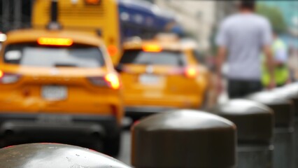 New York City Grand Central Terminal railway station, 42 street. Manhattan Midtown. Yellow taxi cab row, car transport on Pershing Square, NYC, USA. American urban road traffic, people pedestrians.