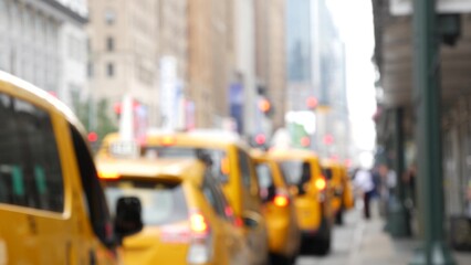 New York City. Row of yellow taxi cars on Manhattan street. Many taxi cabs on Midtown 8th avenue....