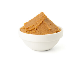 Miso paste isolated. Japanese shiro miso seasoning sauce, fermented soybean spread, brown soy cream