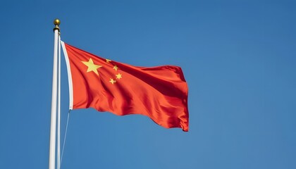 Naklejka premium China flag waving in the wind on light blue sky background