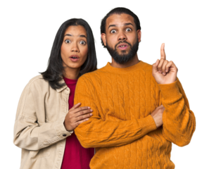 Young Latino couple in studio having some great idea, concept of creativity.