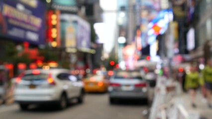 New York City Times Square, Manhattan Midtown Broadway street, USA. American NYC yellow taxi cab, urban road traffic. People. Advertising signs, commercial ads, illuminated billboard screens glowing.