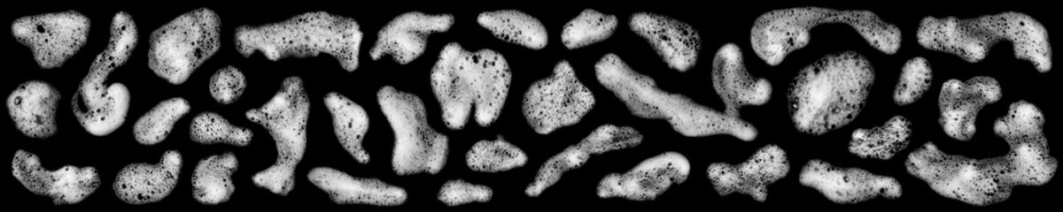 Top view white foam soap isolated on a black background. concept of shampoo bubble, suds texture bathtub. shaving cream gel, bath lather. foam bubble