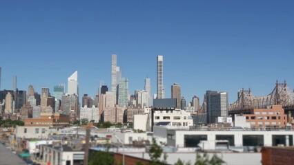 Obraz premium New York City Manhattan skyline cityscape. Queensboro Bridge from Queens to Midtown. Rooftop view point, roof in Long Island, United States. NYC urban architecture in Hunters Point