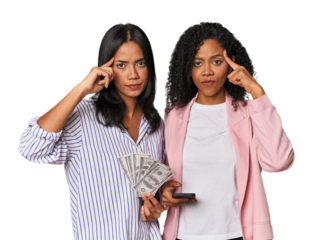 Latin businesswomen with money, phone pointing temple with finger, thinking, focused on a task.