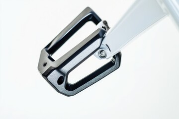 Close-up shot of a metal object on a white surface, perfect for product photography or design purposes