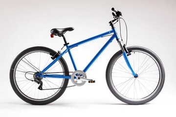 Naklejka premium A lone blue bicycle standing on a clean white surface