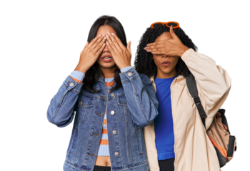 Latin friends ready for vacation afraid covering eyes with hands.