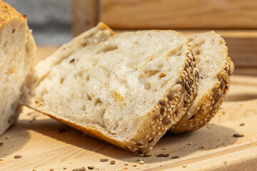 Homemade bread, sourdough wheat loaf with seeds