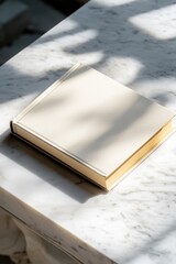 A book placed on a marble table, perfect for academic or literary scenes