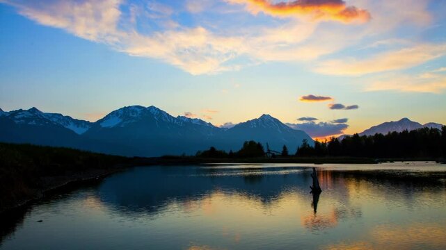 Lockdown Time Lapse Scenic View Of Tranquil Snowcapped Mountains During Sunset - Seward, Alaska