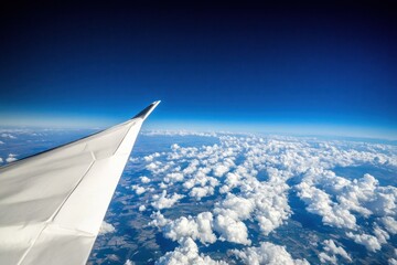Fototapeta premium Airplane wing above clouds, Earth view, travel flight, aerial landscape