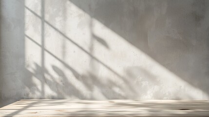Simple white light beige background for product presentation. Light walls and floor with soft shadow and light from the window.