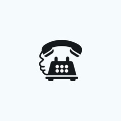 Minimalistic black silhouette of a vintage rotary telephone with a handset resting on top, coiled cord detail, and circular dial design, isolated on a white background