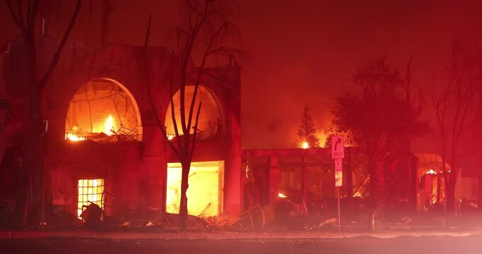 Altadena, California, USA - January 8, 2025: Aided by extreme Santa Ana Winds, the Eaton Fire destroys downtown Altadena.