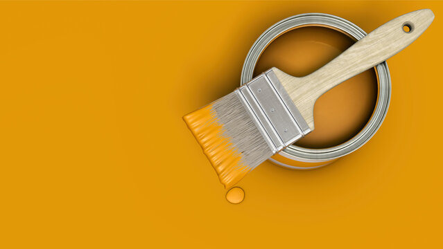 Orange Farbdose mit Pinsel auf orangen Untergrund