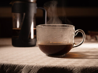 Cup of steaming hot fresh coffee 
