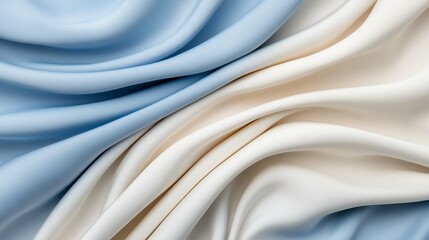 Fototapeta premium Soft fabric drapes in blue and cream colors, showcasing texture and depth in a harmonious blend.