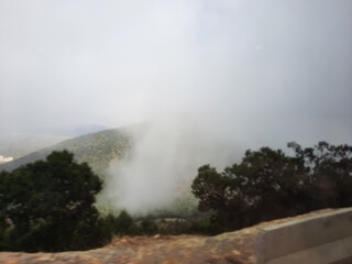 Beautiful view of the misty mountains and the surrounding area from Al Soudah View Point, Strawberry Farm in Abha.