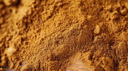 Ground cinnamon powder close up showcasing its rich texture and potential health benefits in culinary and wellness contexts