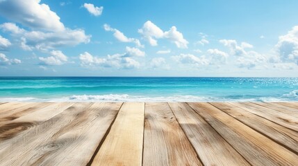 Fototapeta premium Empty wooden tabletop overlooking a serene ocean and beach view with clear blue skies and soft clouds in the background
