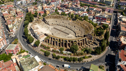 Aerial view of the Flavian Amphitheater, located in Pozzuoli, near Naples. It is the third-largest Roman amphitheater in Italy. It was built by the same architects who constructed the Roman Colosseum.
