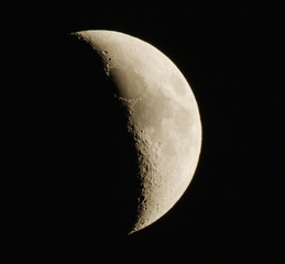 Photograph of Moon in the first quarter lunar phase.