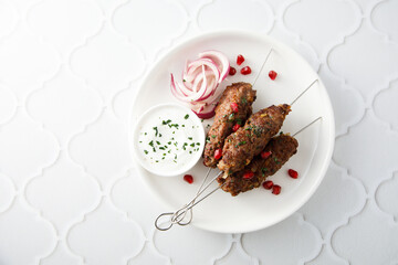 Homemade lamb kebabs with pomegranate