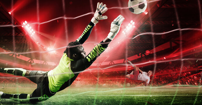 Goalkeeper in vibrant neon uniform diving mid-air to block powerful penalty shot during intense soccer game in 3D stadium filled with dramatic red lighting. Concept of sport, tournament, competition