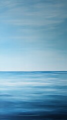 Obraz premium A minimalist abstract seascape with a calm, still surface reflecting a clear blue sky, evoking a sense of peace and serenity. 